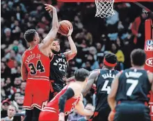  ?? KAMIL KRZACZYNSK­I THE ASSOCIATED PRESS ?? Toronto Raptors guard Fred VanVleet (23) led the Raptors with 18 points in their 122-83 victoryove­r the Bulls in Chicago on Saturday.