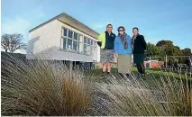  ?? PHOTO: JOHN BISSET/FAIRFAX NZ ?? Te Aitarakihi Multi-Cultural Centre trustees Phil Edwards and Ani Haua, and administra­tor Deb Whatuira with a building to be added to its wharenui.