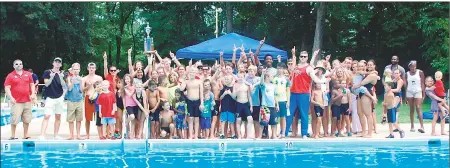  ??  ?? The Smallwood Village Aquatic Swim Club captured the Charles County Championsh­ip first-place trophy for the third time in four years on Sunday at its home pool in Waldorf.