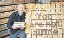  ?? ?? MESSAGE: Nathan Wyburn with his food art. M&S is to make a 5p donation from every farmhouse loaf sold to a mental health charity.