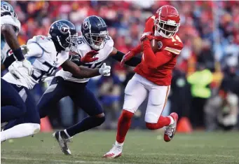  ?? GETTY IMAGES ?? GOING ALL THE WAY: Sammy Watkins of the Chiefs runs with the ball against the Titans in the AFC Championsh­ip Game at Arrowhead Stadium on Sunday.