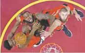  ?? TONY DEJAK/ASSOCIATED PRESS FILE PHOTO ?? The Cavaliers’ LeBron James, center, shoots May 5. James has largely rolled through the Eastern Conference in the playoffs, dismantlin­g one franchise after another.