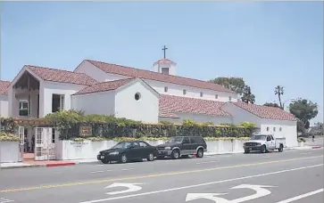  ?? Daily Pilot ?? THE CONGREGATI­ON at St. James the Great church in Newport Beach has been locked out since 2015.