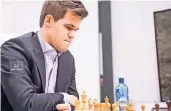  ??  ?? Der aktuelle Weltmeiste­r Magnus Carlsen.