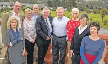  ??  ?? VisitScotl­and chief executive Malcolm Roughead, centre, with the board of VisitArran at the Auchrannie.