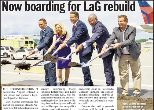  ??  ?? Noah Goldberg and Glenn Blain Gov. Cuomo (center) digs in Tuesday at groundbrea­king on constructi­on of new Delta terminal at LaGuardia Airport.