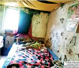  ??  ?? Cracked walls and a ceiling of thick polythene sheets in Jeyarani’s bedroom