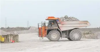  ??  ?? This Hitachi earth- moving truck, working in the McCook Reservoir, can carry 150 tons of rock.