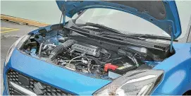  ??  ?? The Swift’s hybrid system is at the mild end of things, but promises a 15 per cent reduction in fuel consumptio­n.