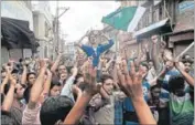  ?? WASEEM ANDRABI/HT ?? People shout pro-freedom slogans in Srinagar on Monday to protest the killing of a teenager by security forces.