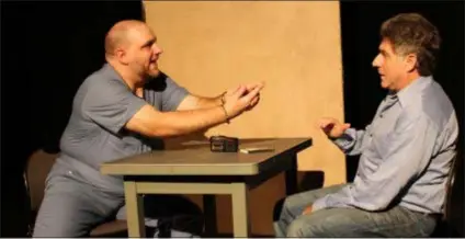  ?? SUBMITTED PHOTO ?? Michael Steven Schultz interviews Anthony SanFilippo, playing one of the murderers of Matthew Shepard, in ‘The Laramie Project: Ten Years Later’ at the Players Club of Swarthmore.