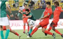  ?? AFP ?? Saleh Al-Shehri kicks towards the goal during the 2022 FIFA World Cup qualificat­ion group D football match between Saudi Arabia and Singapore at the King Saud University Stadium in Riyadh on June 11, 2021.