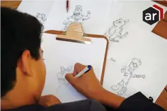  ?? PICTURE: DAVID RITCHIE/AFRICAN NEWS AGENCY (ANA) ?? UNLEASHING PASSION: Reece Swartz, 11, a talented cartoonist, draws his characters within minutes. He plans to create a wordless comic book.