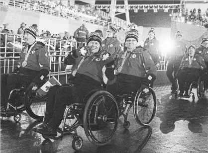  ?? JOEL MARKLUND THE ASSOCIATED PRESS ?? Team Canada enters the stadium during the Paralympic­s closing ceremony on Sunday.