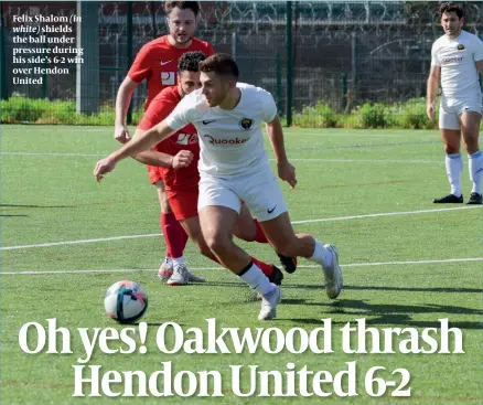  ?? PHOTO: GEORGIA ROSENBERG ?? Felix Shalom (in white) shields the ball under pressure during his side’s 6-2 win over Hendon United