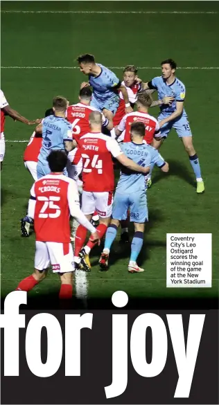  ??  ?? Coventry City’s Leo Ostigard scores the winning goal of the game at the New York Stadium