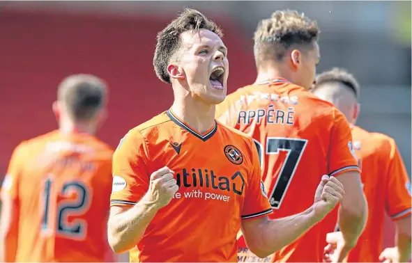  ??  ?? Lawrence Shankland can’t hide his delight after bagging all four goals in Dundee United’s win over Inverness Caley Thistle.
