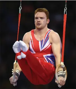  ??  ?? Gymnasts like Dan Purvis will have to wait until they return to training