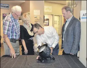  ?? HARRY suLLIVAN/tRuRO DAILY NEWs ?? Richard Urquhart of Phillips Lighting is seen explaining some of the capabiliti­es of new stage lighting to be installed at the Marigold Cultural Centre. From left are MP Bill Casey, Robyn Eddy of Eddy Group, and Vern Hearn, chairman of the Cobequid...