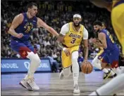  ?? AARON ONTIVEROZ — THE DENVER POST ?? Anthony Davis (3) has averaged 28.7 points and 15.7 rebounds in the Lakers' last three games.
Today: Clippers at Lakers, 7p.m., SpecSN, BSSC, ESPN
