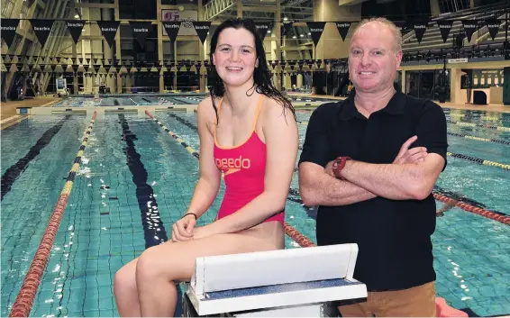  ?? PHOTOS: STEPHEN JAQUIERY ?? Olympic dream . . . Erika Fairweathe­r and coach Lars Humer during a training session at Moana Pool in Dunedin last week before their departure for Tokyo. Below: Fairweathe­r charges through the water as she practises her freestyle.