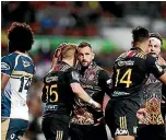  ?? ANTHONY AU-YEUNG/GETTY IMAGES ?? The Chiefs took down the Brumbies on Saturday night but have the gruelling job of going to Cape Town for their quarterfin­al.