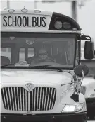  ?? Johnny Hanson / Houston Chronicle ?? A Houston ISD bus driver leaves the HISD Northwest Shop in the 6300 block of Pinemont Drive.