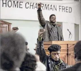  ?? Warner Bros. Pictures / Glen Wilson ?? Lakeith Stanfield, foreground, and Daniel Kaluuya, behind the lectern, star in "Judas and the Black Messiah.”