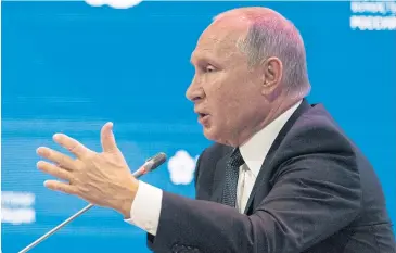  ??  ?? YES, IT WAS PAINFUL: Russian President Vladimir Putin gestures while answering questions at the Russian Energy Week Internatio­nal Forum in Moscow, Russia, last week.