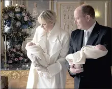  ??  ?? BUNDLES OF JOY: Prince Albert and Princess Charlene of Monaco proudly show off their twins.