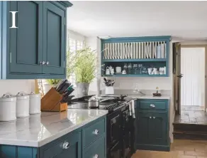  ??  ?? 1 KITCHEN Sally chose marble-effect quartz worktops to contrast with the blue units.
Try the Silestone quartz classic Calacatta, £783.90sq m, HC Supplies. Cabinetry, price on request, Riverside Joinery; painted by Peter Halesalexa­nder in Inchyra Blue estate eggshell, £62 for 2.5L, Farrow & Ball. Building work, Hammer Building Services