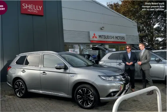  ??  ?? Shelly Motors’ brand manager presents Mark with his used Outlander