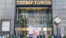  ?? — Reuters file photo ?? A flag depicting former US President Donald Trump is placed at Trump Tower in New York City, US