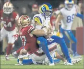  ?? NHAT V. MEYER — BAY AREA NEWS GROUP ?? The 49ers’ Nick Bosa sacks Los Angeles Rams quarterbac­k Matthew Stafford during Monday’s win at Levi’s Stadium.