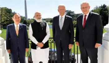  ?? PHOTOGRAPH: PIB ?? (Left - Right) Prime Minister of Japan Yoshihide Suga, Prime Minister of India Narendra Modi, President of USA Joe Biden and the Prime Minister of Australia Scott Morrison at the QUAD Summit, in USA on September 24, 2021