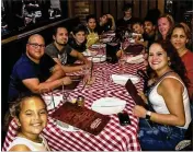  ?? FAMILY PHOTO ?? A birthday party for Jovanni Sierra (on left in yellow shirt) was held Sunday in Palm BeachGarde­ns. Corey Johnson (at head of table in back) is chargedwit­h killing Jovanni andwoundin­g two others during a sleepover at a BallenIsle­s home.