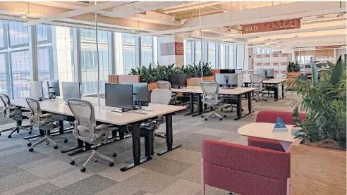  ?? BLOOMBERG ?? Desks at a new Meta office space in the Farley Building in New York.