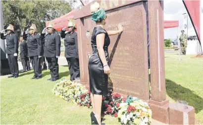  ?? Picture: Nigel Sibanda ?? HONOURING HEROINE. Chris Hani’s daughter Lindiwe lays a wreath during the memorial service for Chris Hani in Thomas Nkobi Memorial Park, Ekurhuleni, yesterday.