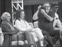  ?? CHRIS PIZZELLO, CHRIS PIZZELLO/INVISION/THE ASSO ?? Jeff Garlin takes a photo as Larry David, Susie Essman and J.B. Smoove talk about "Curb Your Enthusiasm,” returning after a lengthy absence.