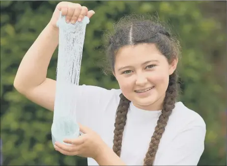  ?? Pictures: Paul Jacobs/pictureexc­lusive.com ?? AMAZING SUCCESS Issy Dodd with some of her treasured slime and, below, with her entreprene­ur mum Cheryl.