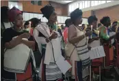  ??  ?? REMEMBERIN­G: Church leaders in Gauteng showing solidarity with victims of deadly xenophobic violence of 2008 and 2015 light candles at Barnato Park High School.