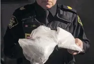  ?? CHRIS YOUNG / THE CANADIAN PRESS FILES ?? Canada’s police chiefs are urging the federal government to beef up its fight against the opioid crisis by closely vetting people who import pill presses.