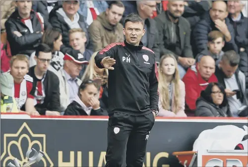  ?? PICTURE: SIMON BELLIS/SPORTIMAGE ?? SPURRED ON: Barnsley’s manager Paul Heckingbot­tom will pit his wits against Tottenham Hotspur boss Mauricio Pochettino tonight.