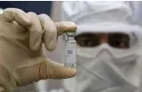  ?? AFP ?? Scientists around the world are running trials on potential vaccines for Covid-19