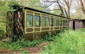  ?? STAGS ?? The surviving part of the body of 1885-built LSWR six-wheel six-compartmen­t coach No. 757 stands in the gardens of converted Brampford Speke station.