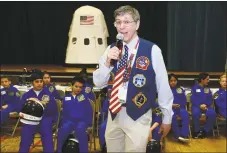  ??  ?? Teacher and Commander-in-Chief Andrew Pearce addresses the crowd during Columbus Magnet School’s annual Young Astronauts Mission Landing event Friday.