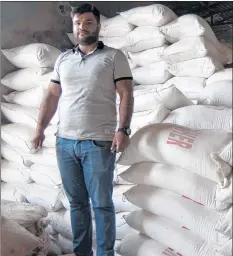  ?? CP PHOTO ?? Gaurav Rai poses at his feed plant in Amritsar, India.