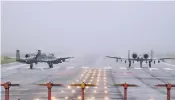  ?? HONG KI-WON/YONHAP VIA AP ?? U.S. Air Force A-10 attack aircraft wait to take off Thursday on the runway at the Osan U.S. Air Base in Pyeongtaek, South Korea.