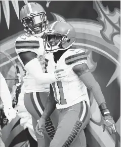  ?? ASSOCIATED PRESS FILE PHOTO ?? Cleveland Browns wide receiver Antonio Callaway celebrates his touchdown with tight end David Njoku, left, at Cincinnati on Sunday. At 4-6-1, the Browns are on the fringe of AFC wild-card contention.