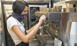  ?? PAULW. GILLESPIE/CAPITAL GAZETTE ?? Barista Asha Marie Bayne, 18, makes a latte at Second Alarm Brewhouse in Pasadena.